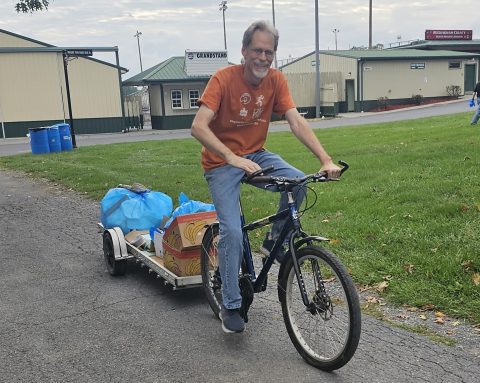 A volunteer collecting trash