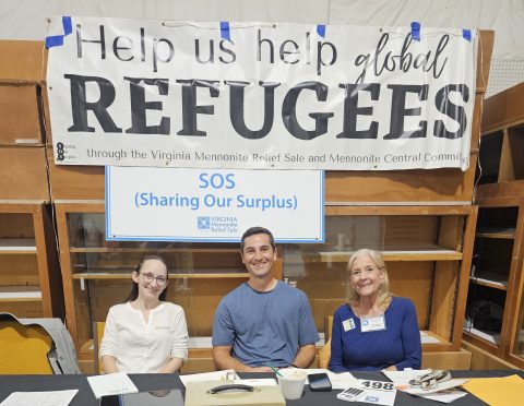 Volunteers at the SOS info table